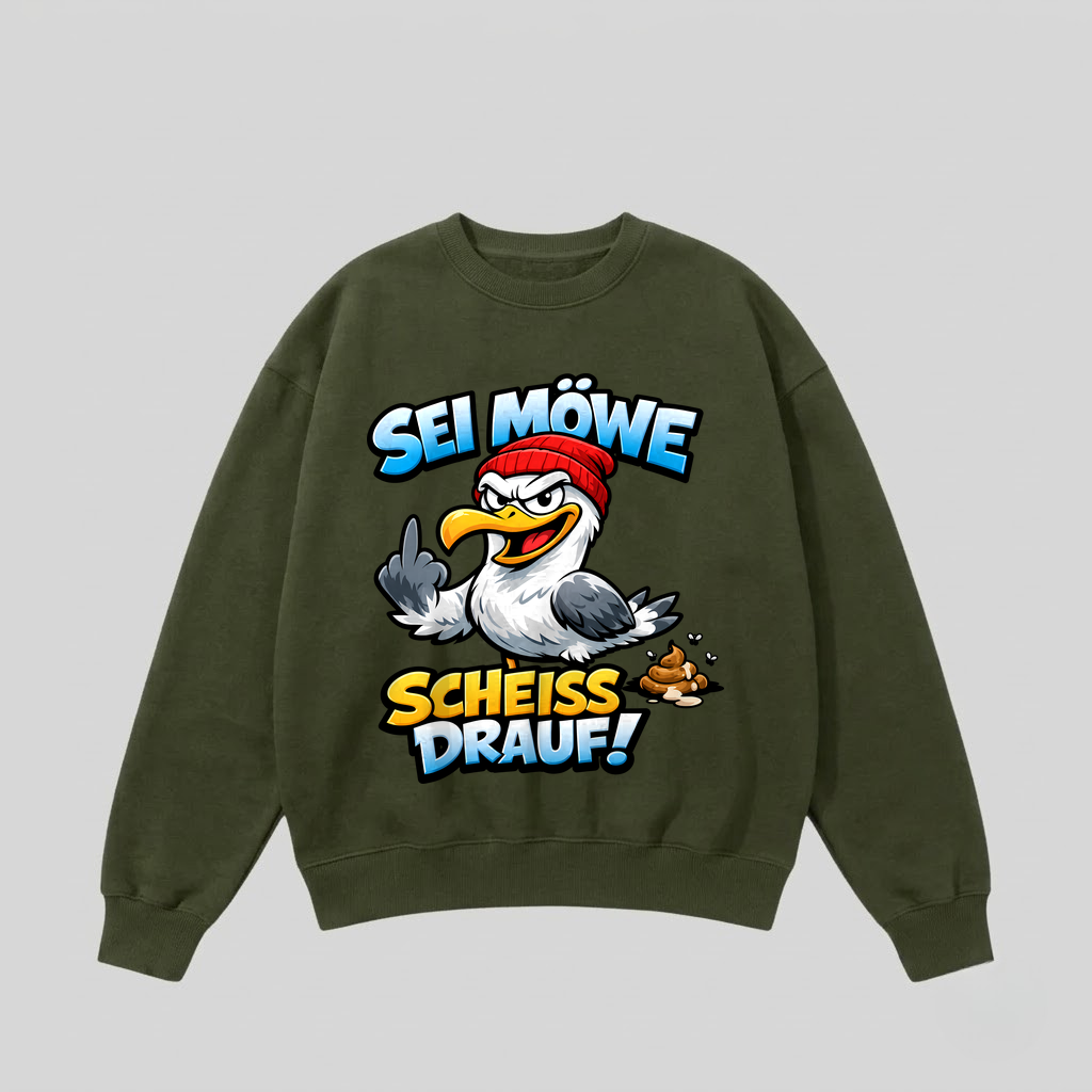 Grüner Pullover mit Spruch „Sei Möwe – Scheiß drauf!“